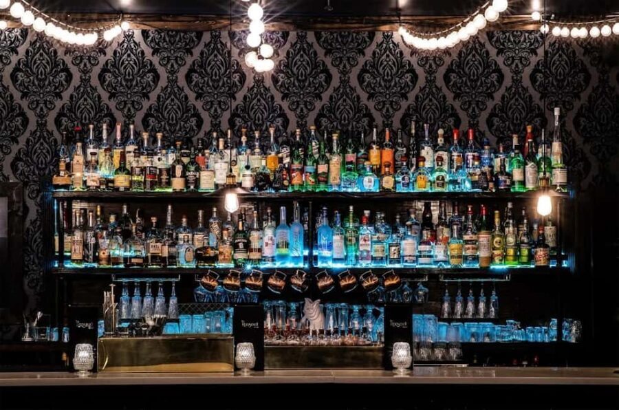 Austin: Best Bars and Bats 3-Hour Guided Tour - 6th Street energy and the Dead Rabbit Austin finale