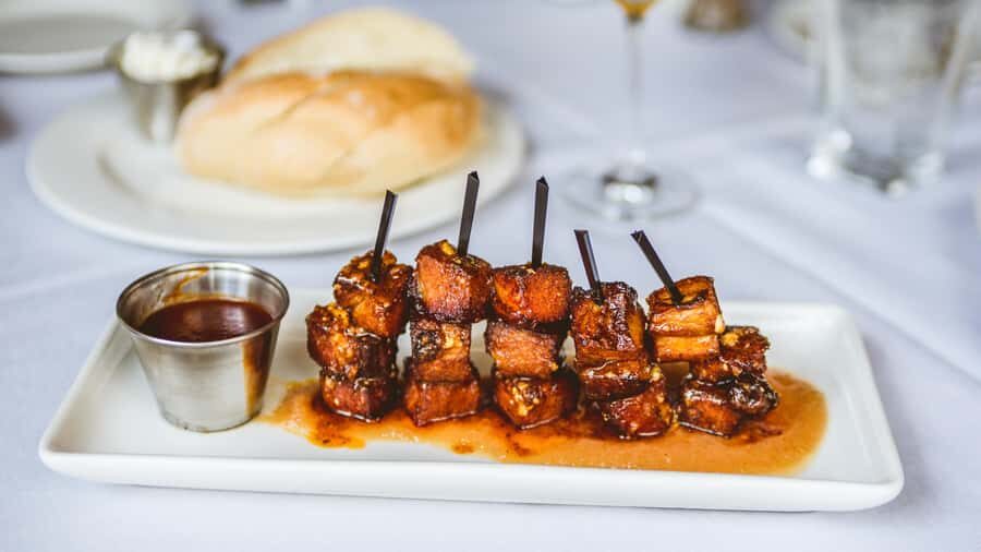Austin: Downtown Food Tour with 6+ Tastings of Local Flavors - Starting downtown at Fareground One Eleven (and the orange umbrella trick)