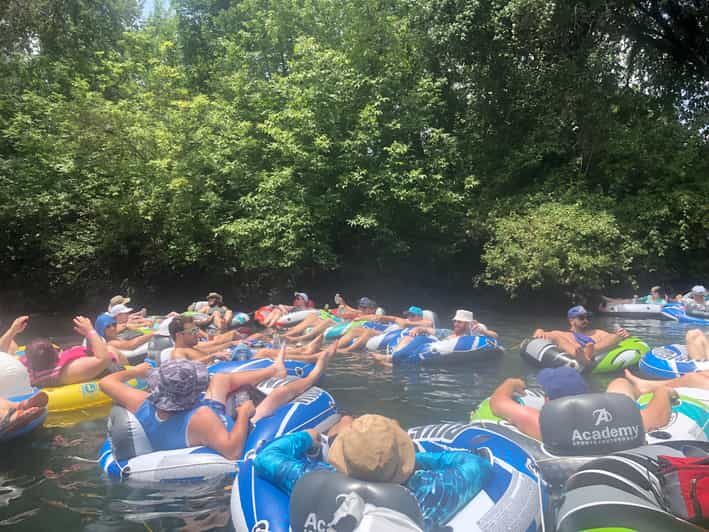 Austin: San Marco River BYOB Guided Tubing Expereince - Getting started at Cosmic Coffee: the neon sign moment